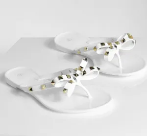 STUDDED BOW JELLY THONG SANDALS